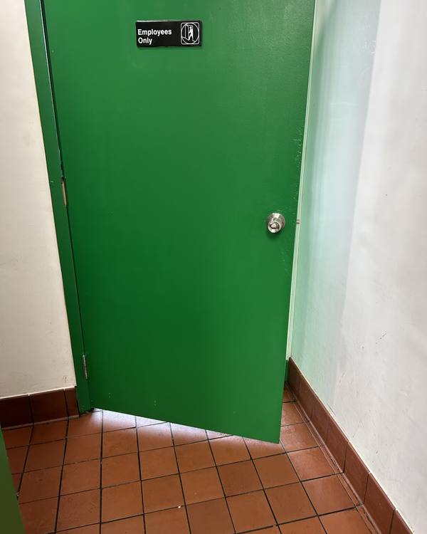 Employees-only door freshly painted