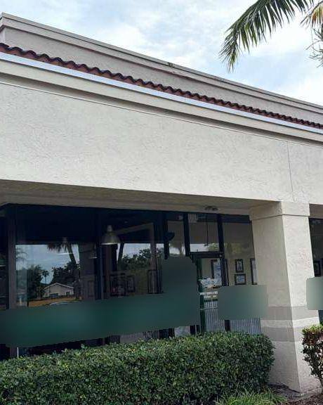 Storefront facade before new exterior lights were installed