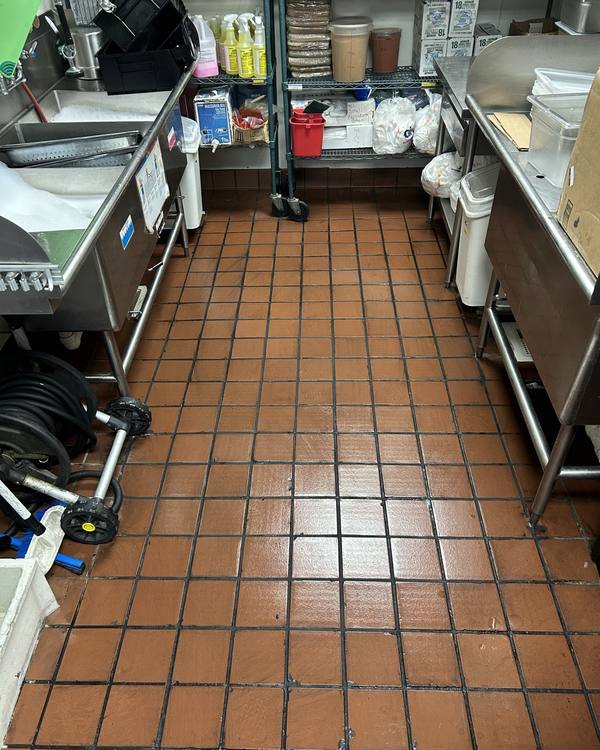 Kitchen tile floor with new grout