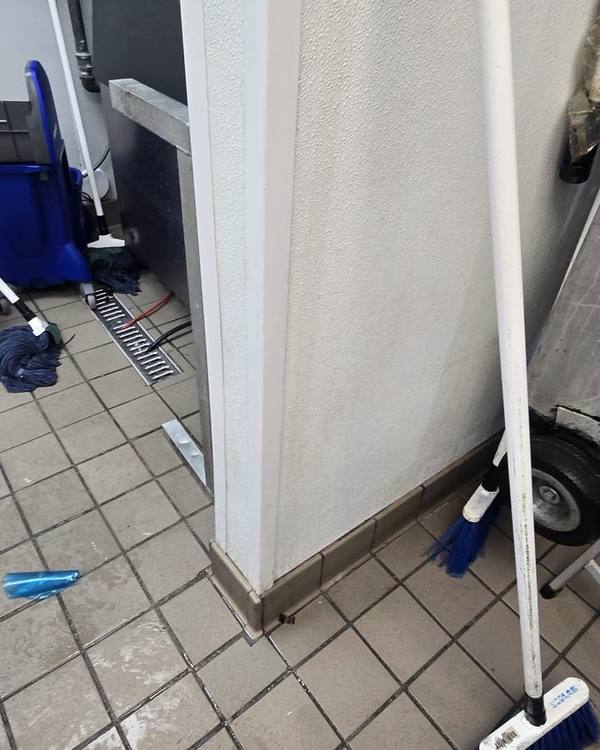 Repaired wall corner in a commercial kitchen